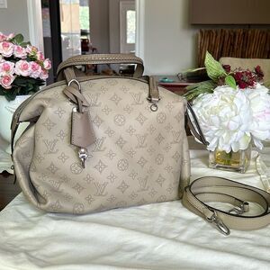 Louis Vuitton NWOT bag with cross body straps silver keys  locks dust bag